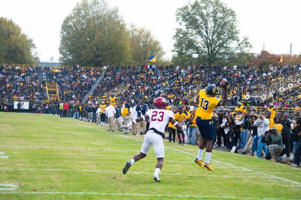 Wide receiver Elijah Bell (#3) brings down touchdown pass. Bell broke the school’s single-season touchdown receptions record with his 11th TD  of the season. 
Photo by Johnathan Bryant
