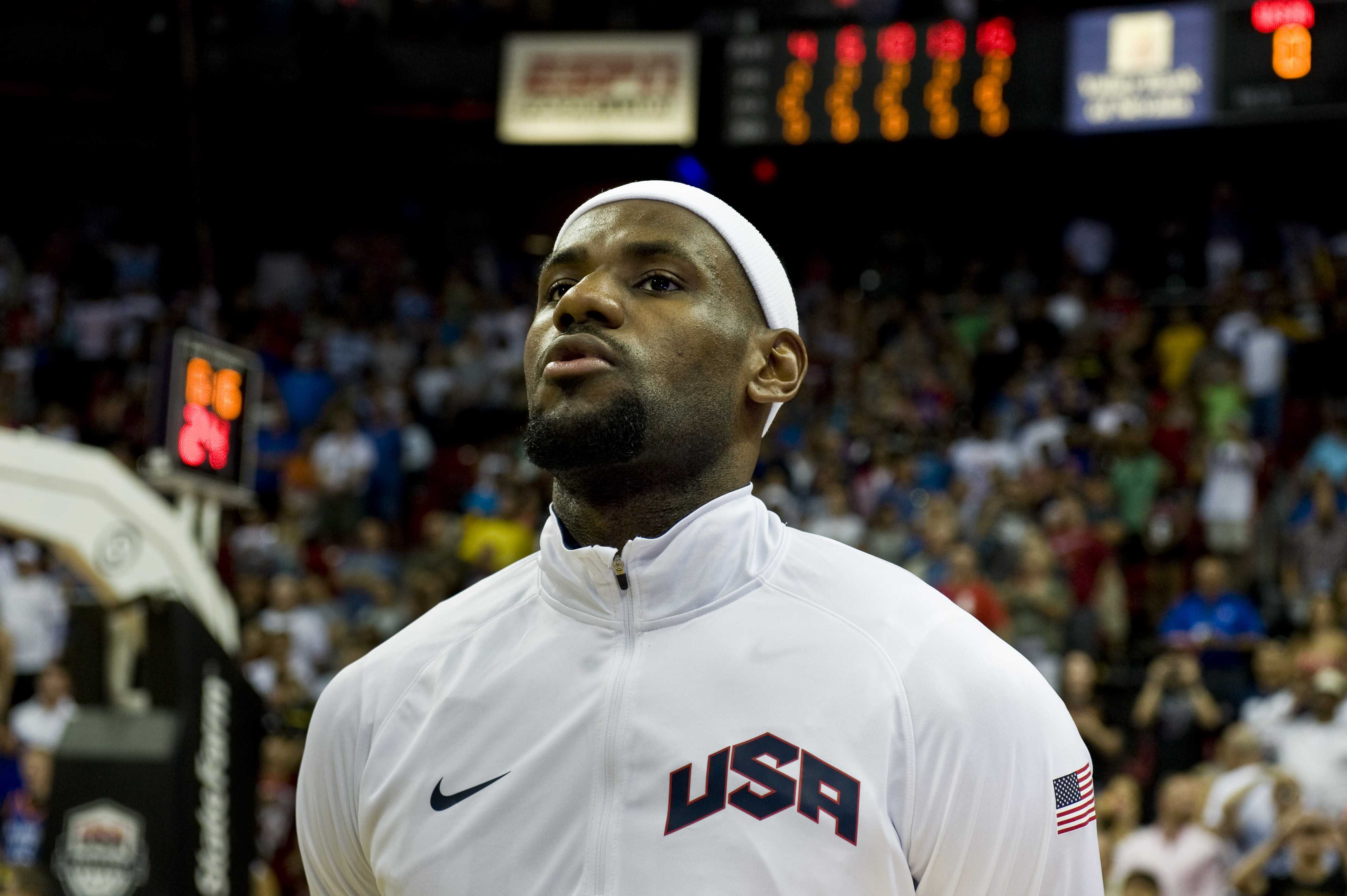 Lebron James, USA Olympic Men's Basketball player, listens to the National Anthem prior to the start of the USA versus Dominican Republic exhibition game July 12, 2012, at the Thomas & Mack Center, Las Vegas, Nev. James is the only member of the 2012 Champion Miami Heat team on the Olympic Basketball team this year. (U.S. Air Force photo by Airman 1st Class Daniel Hughes)