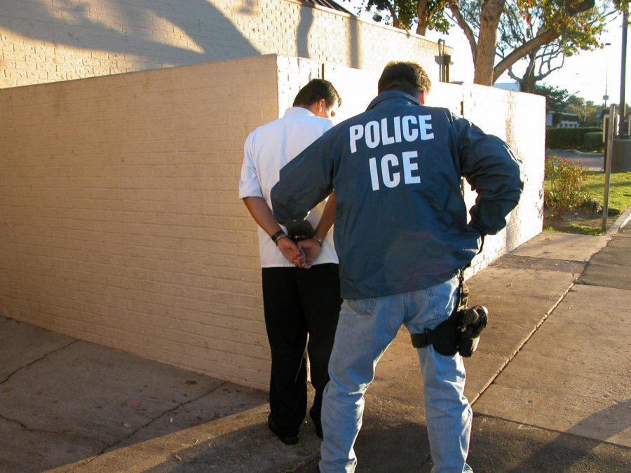 U.S. Police I.C.E. arrest a man.