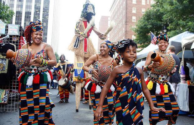 Community members dance and celebrate at the African American Cultural Festival of Raleigh and Wake County.
Photo courtesy of aacfestival.org