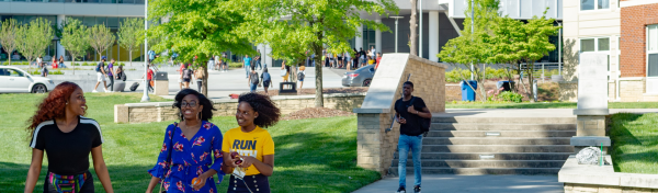 Students converse with one another as they walk through campus at North Carolina Agricultural and Technical State University in Greensboro, N.C.