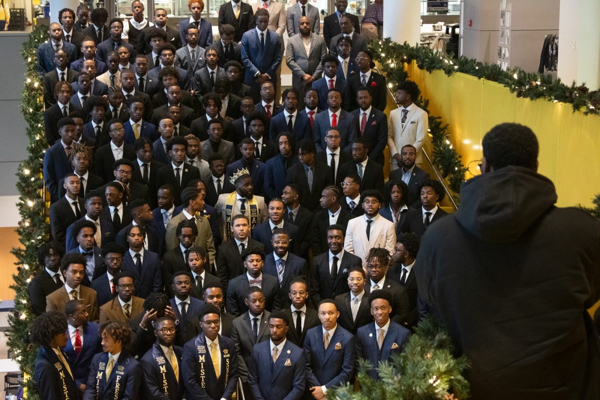 A&T men pose for photographers during mental health & wellness photoshoot.
